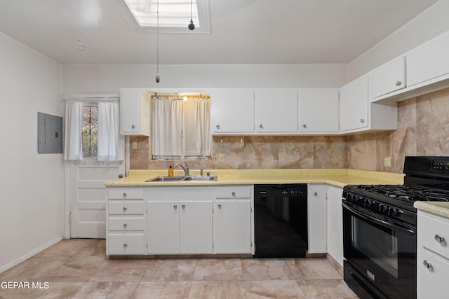 kitchen with electric panel, backsplash, light countertops, black appliances, and a sink