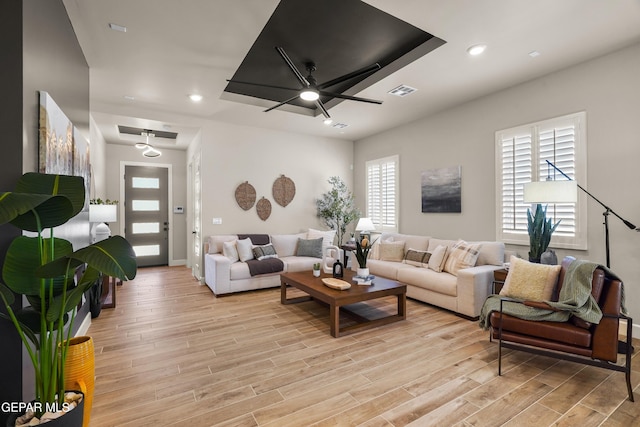 12741 Eltham Dr, Horizon City, TX 79928 - living room featuring visible vents, baseboards, ceiling fan, recessed lighting, and light wood finished floors