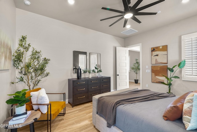 12741 Eltham Dr, Horizon City, TX 79928 - bedroom with light wood-style floors, recessed lighting, baseboards, a ceiling fan, and visible vents
