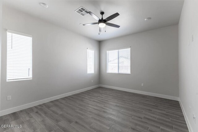 unfurnished room featuring ceiling fan and wood-type flooring