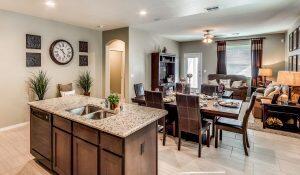 dining room with sink and light tile patterned flooring