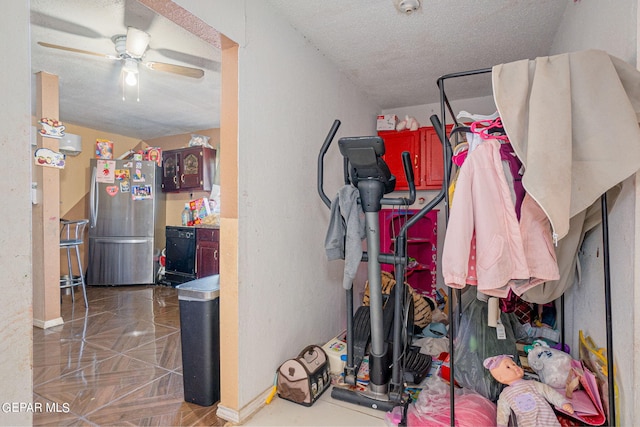 storage area featuring a ceiling fan