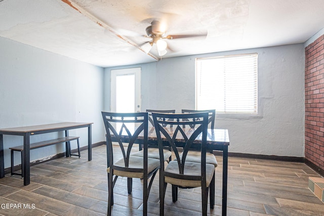 dining room with visible vents, baseboards, and dark wood-type flooring