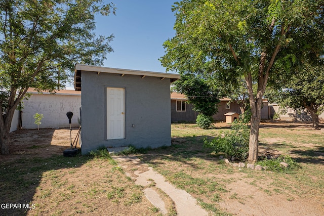 view of outdoor structure with fence