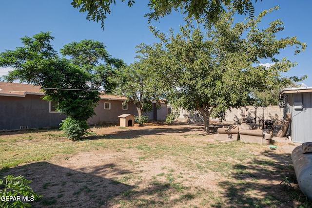 view of yard with fence