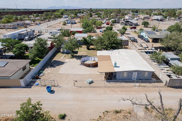 birds eye view of property with a residential view