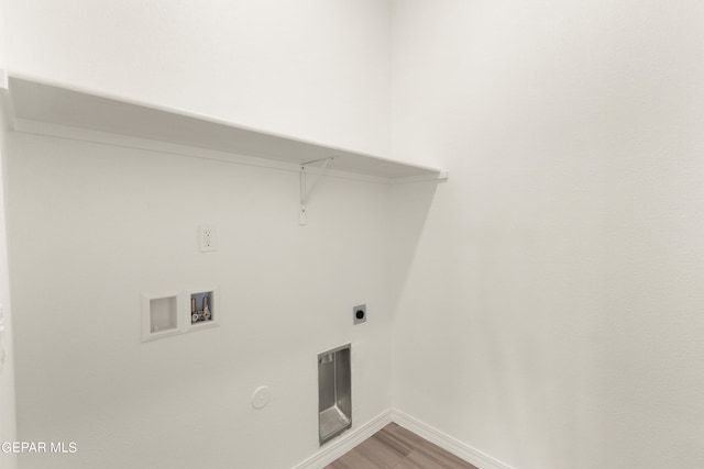 laundry room featuring washer hookup, hardwood / wood-style floors, and electric dryer hookup