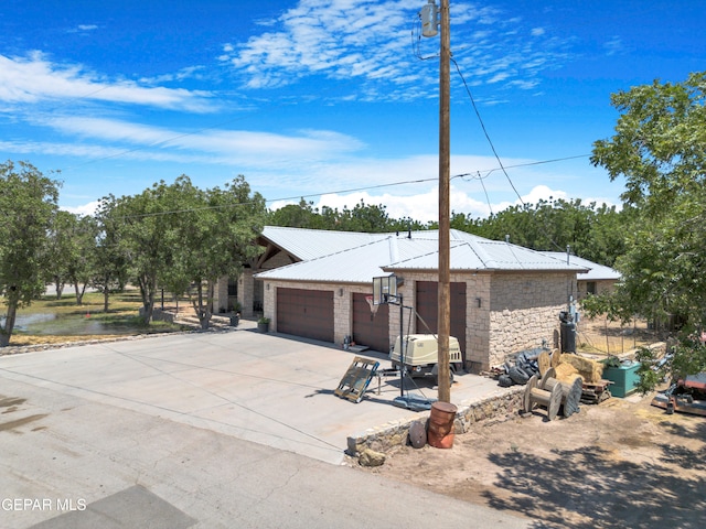 ranch-style house featuring a garage