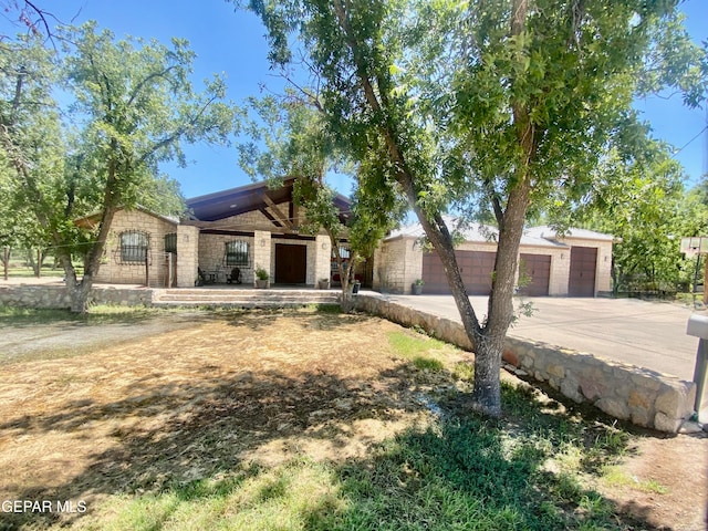 view of front of property with a garage