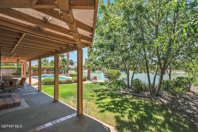 view of patio featuring a water view