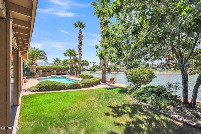 view of yard with a water view