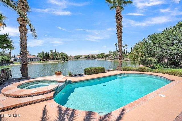 view of swimming pool featuring an in ground hot tub and a water view