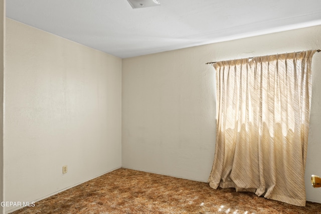 view of carpeted spare room