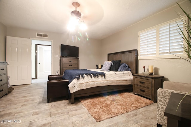 bedroom featuring ceiling fan