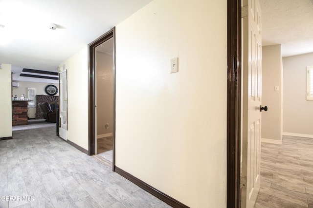 hall featuring light hardwood / wood-style floors