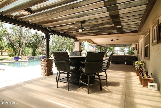 view of patio featuring an outdoor hangout area and ceiling fan