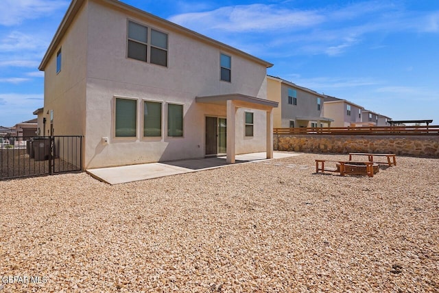 rear view of house with a patio area