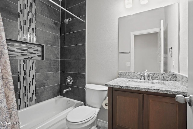 full bathroom with shower / tub combo, vanity, and toilet