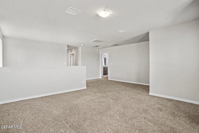 empty room featuring carpet flooring