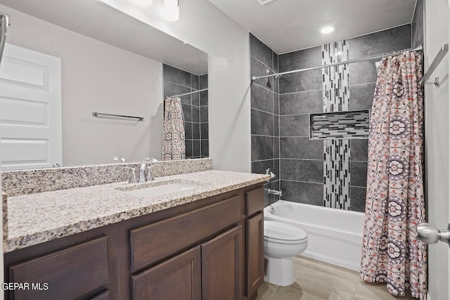 full bathroom with shower / bathtub combination with curtain, vanity, hardwood / wood-style flooring, and toilet