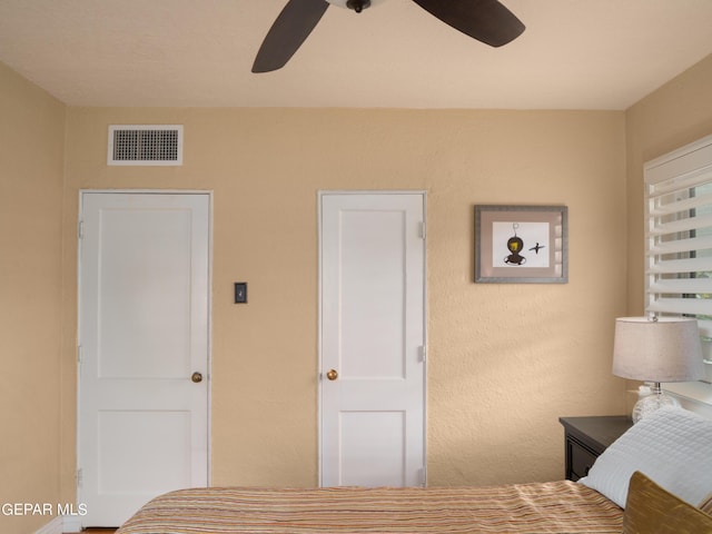 bedroom featuring ceiling fan