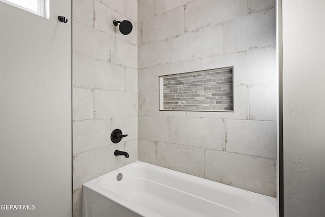 bathroom featuring shower / tub combination