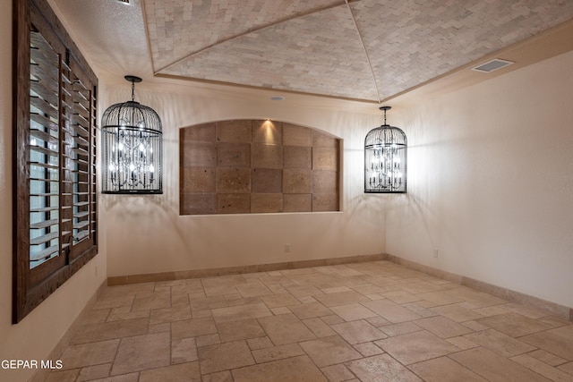 878 Cortona Pl, El Paso, TX 79928 - empty room with brick ceiling, lofted ceiling, and a chandelier