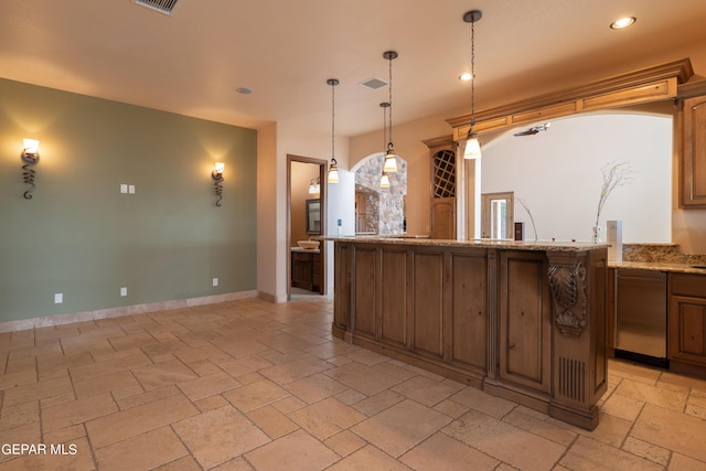 878 Cortona Pl, El Paso, TX 79928 - kitchen with light stone countertops, stainless steel dishwasher, and decorative light fixtures