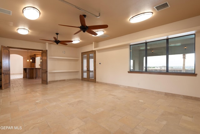 878 Cortona Pl, El Paso, TX 79928 - unfurnished room featuring french doors and ceiling fan