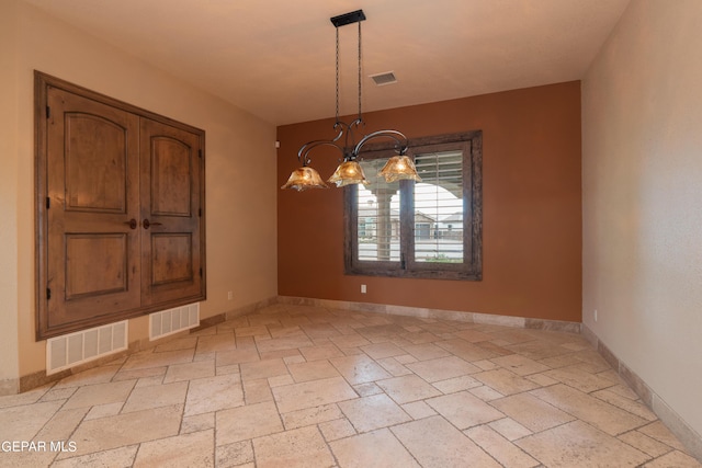 878 Cortona Pl, El Paso, TX 79928 - unfurnished dining area featuring a chandelier