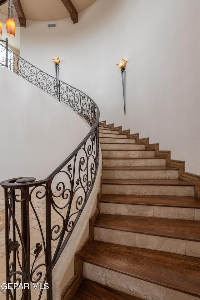 878 Cortona Pl, El Paso, TX 79928 - stairs featuring an inviting chandelier