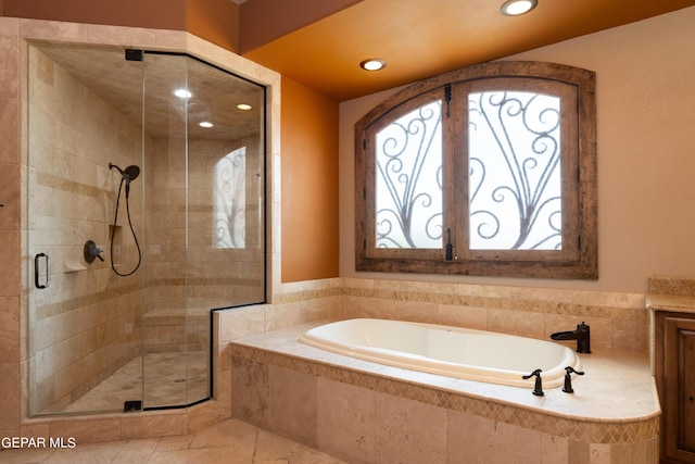 878 Cortona Pl, El Paso, TX 79928 - bathroom featuring plus walk in shower and vanity