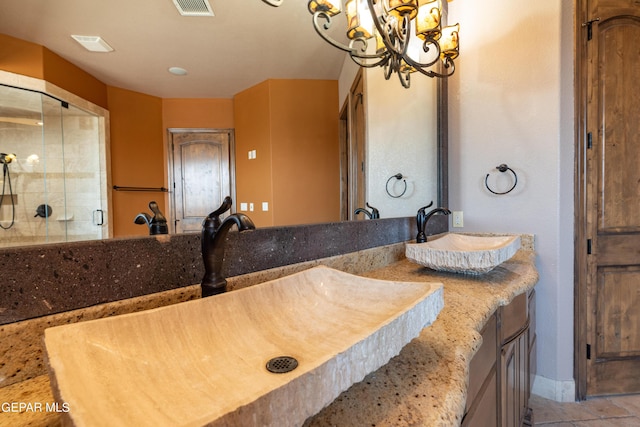 878 Cortona Pl, El Paso, TX 79928 - bathroom with vanity, a notable chandelier, and walk in shower