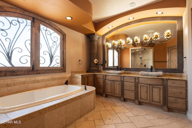878 Cortona Pl, El Paso, TX 79928 - bathroom featuring vanity, plus walk in shower, and decorative columns