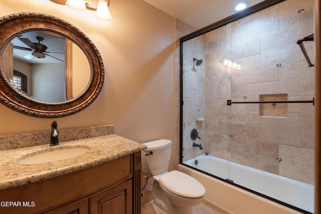 878 Cortona Pl, El Paso, TX 79928 - full bathroom featuring vanity, ceiling fan, enclosed tub / shower combo, and toilet