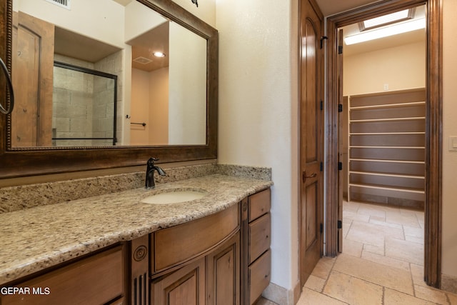 878 Cortona Pl, El Paso, TX 79928 - bathroom featuring vanity and walk in shower