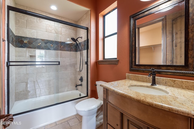 878 Cortona Pl, El Paso, TX 79928 - full bathroom with enclosed tub / shower combo, vanity, and toilet