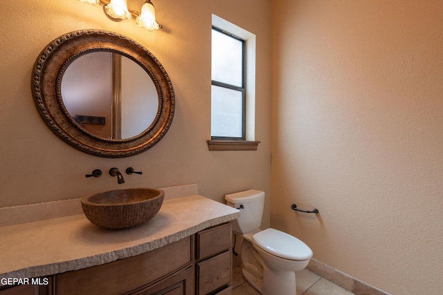 878 Cortona Pl, El Paso, TX 79928 - bathroom featuring tile patterned flooring, vanity, and toilet