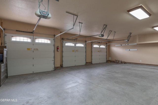 878 Cortona Pl, El Paso, TX 79928 - garage featuring a garage door opener