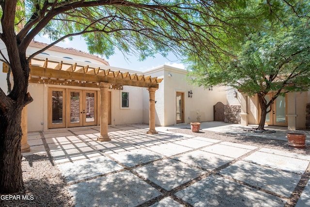 878 Cortona Pl, El Paso, TX 79928 - back of house with a pergola, a patio area, and french doors