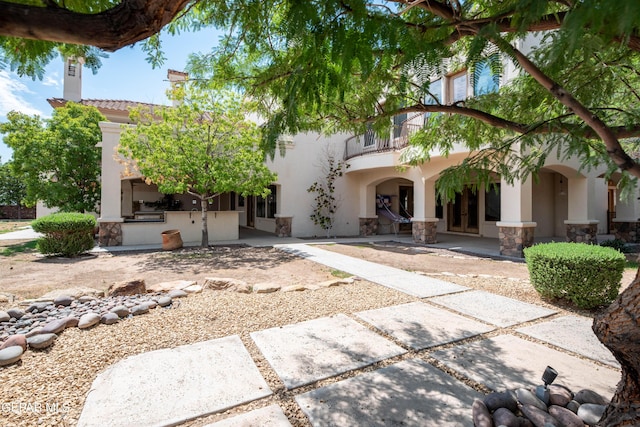 878 Cortona Pl, El Paso, TX 79928 - mediterranean / spanish-style home with an outdoor kitchen, a balcony, and a patio area