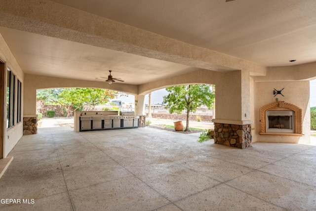 878 Cortona Pl, El Paso, TX 79928 - view of patio / terrace featuring area for grilling, exterior fireplace, exterior kitchen, and sink