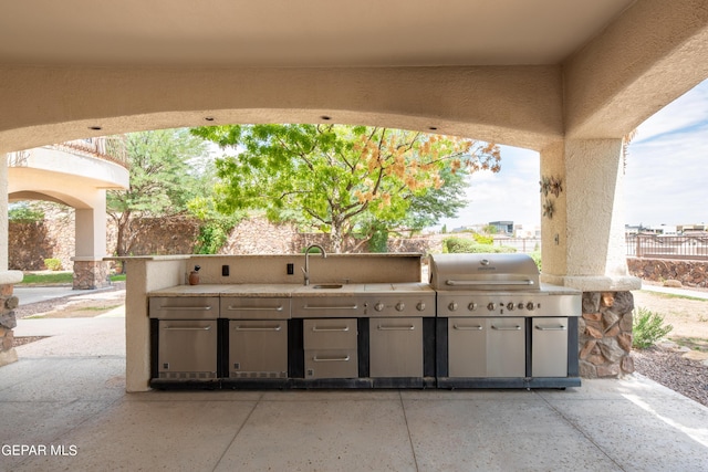 878 Cortona Pl, El Paso, TX 79928 - view of patio featuring exterior kitchen, area for grilling, and sink