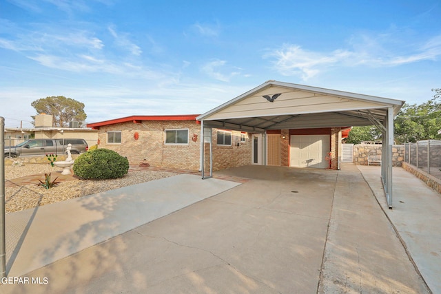 view of front of property with a carport