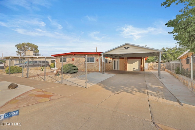 ranch-style home featuring a carport