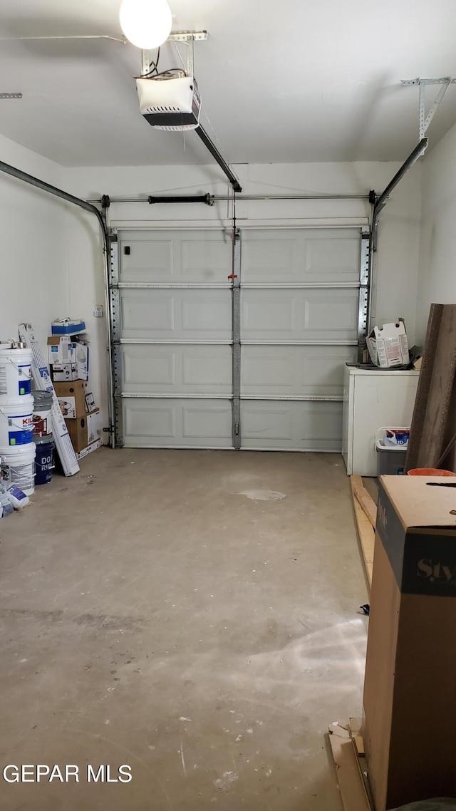 garage featuring a garage door opener