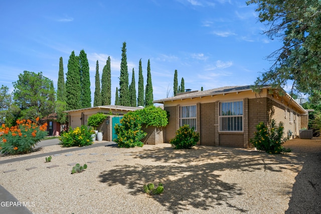 ranch-style house featuring central AC