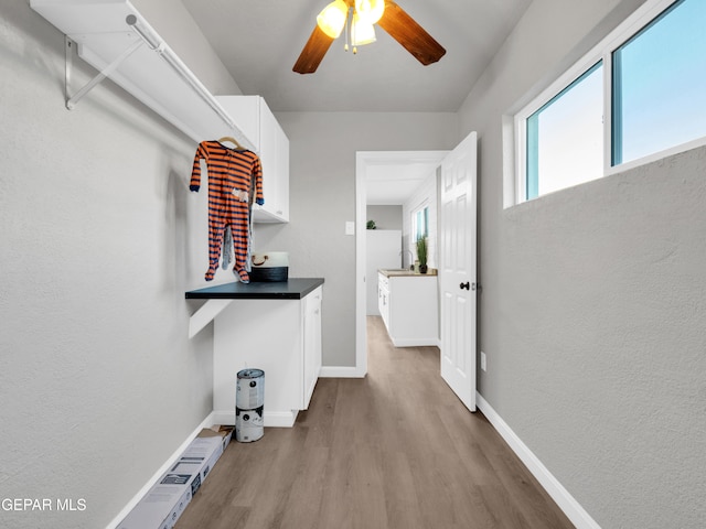 hallway featuring light hardwood / wood-style flooring