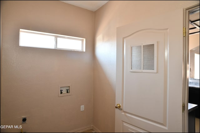 laundry room featuring hookup for a washing machine and electric dryer hookup