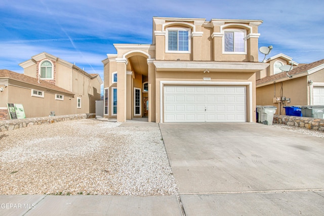 view of front of property with a garage